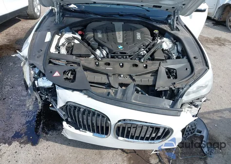 2015 BMW 750Li z USA, uszkodzony, nr VIN WBAYE8C52FD781788